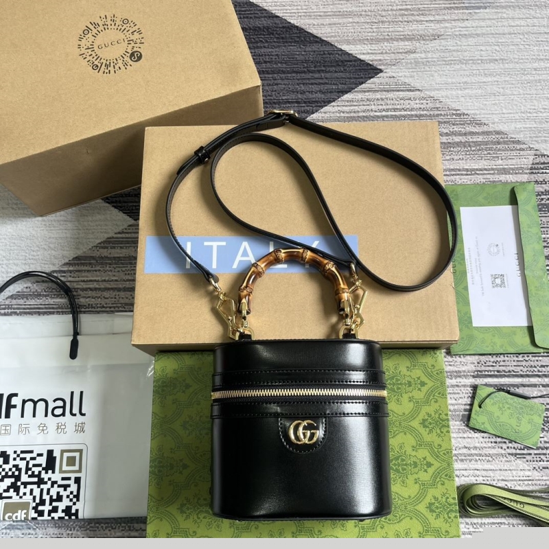 G*u*i cosmetic bags